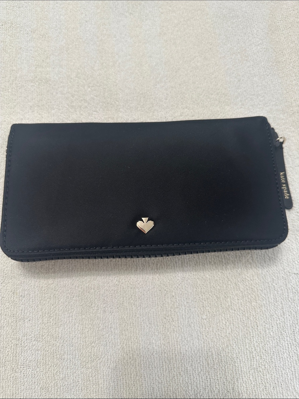 kate spade Black Zip-Around Wallet with Gold Spade Accent